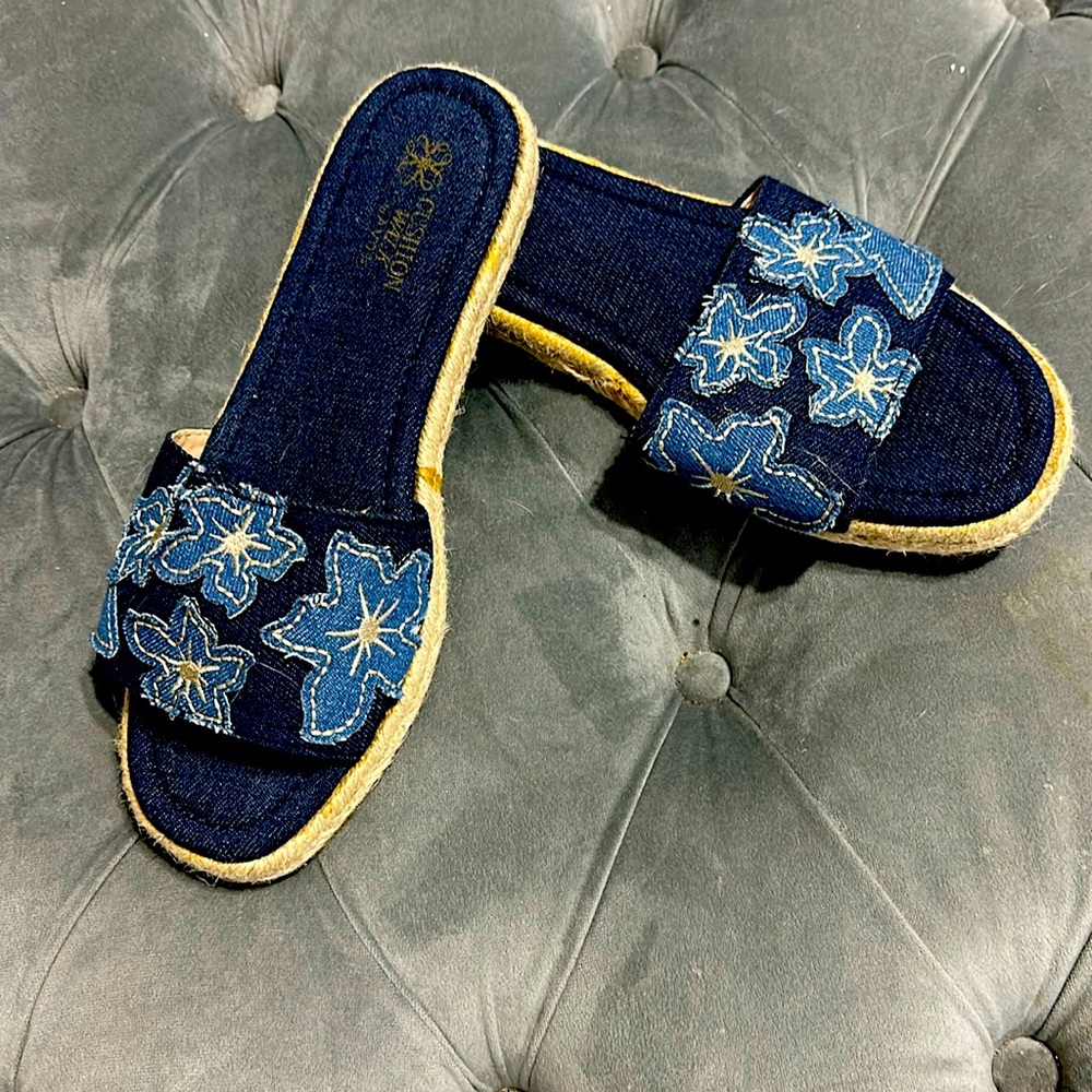 Blue Jean Slides with flower decals.